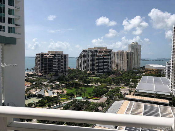 Panoramic view of high-rise buildings near a waterfront.