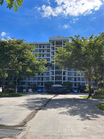 Front view of a multi-story residential building.