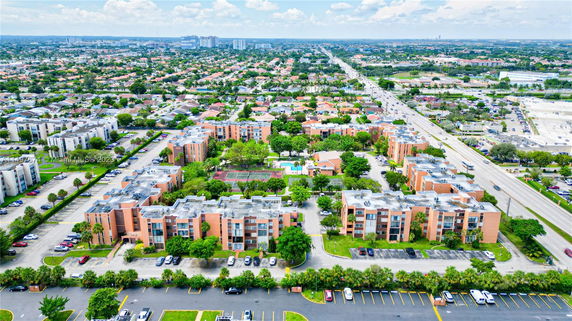 Aerial view of a residential area with multiple apartment buildings and surrounding roads.