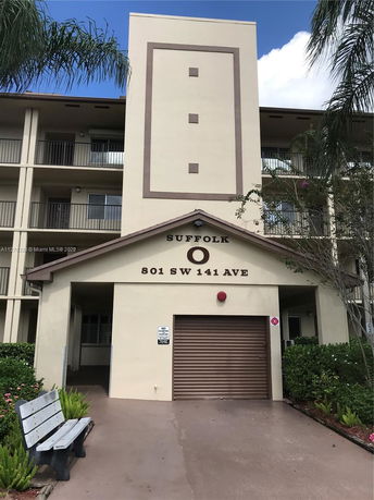 Front view of a multi-story residential building.