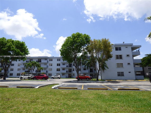 Front view of a multi-story apartment building.