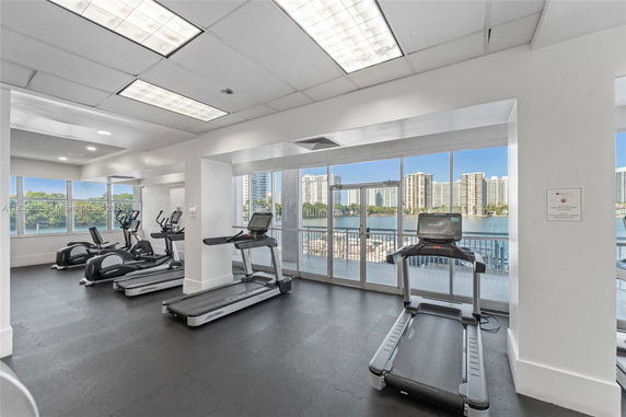 Interior view of a gym with treadmills and exercise machines.