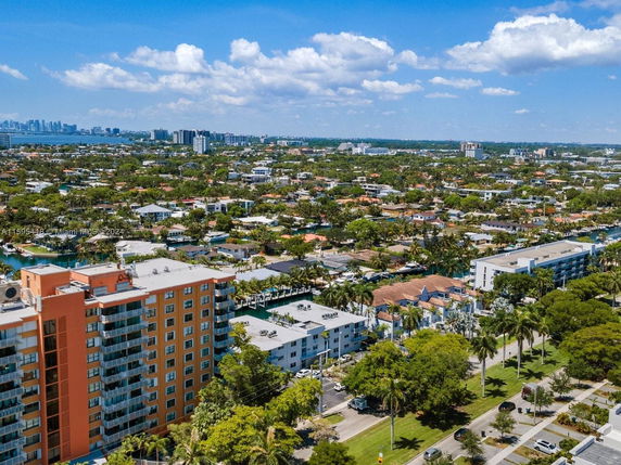 Panoramic view of urban area with residential buildings and greenery.