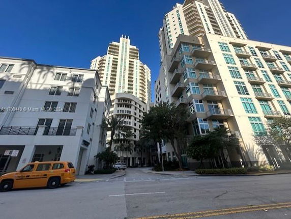 Front view of multiple high-rise buildings with modern architecture.