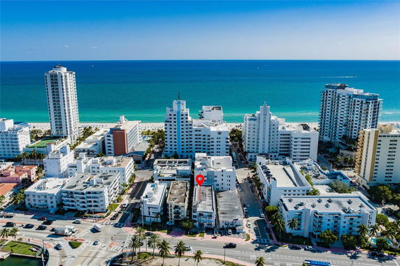 Aerial view of buildings near the ocean.