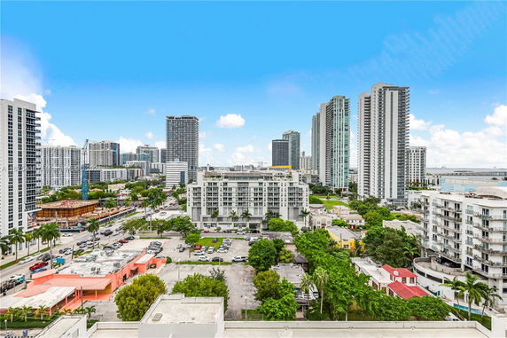 Cityscape with multiple high-rise buildings.