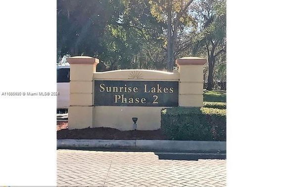 Entrance sign for Sunrise Lakes Phase 2.