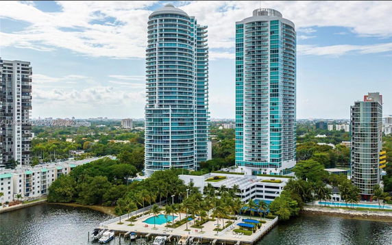 View of high-rise residential buildings in a waterfront area.