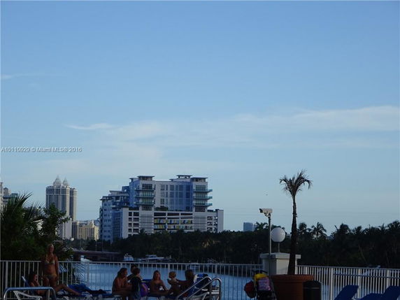 View of multiple modern buildings in the distance.