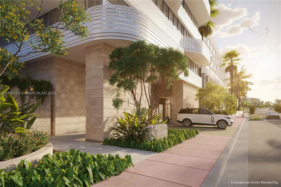Front view of a multi-story building with modern architectural design and landscaped surroundings.