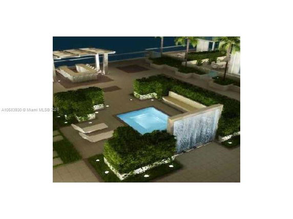 Rooftop area with a small pool, lounge chairs, and greenery. Water feature present near the pool.