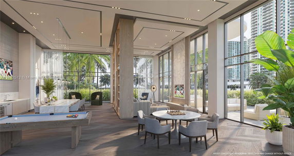 Interior of a modern clubhouse with large windows, seating areas, and a pool table.