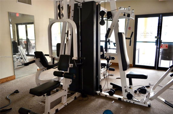 Interior view of a gym with exercise equipment.
