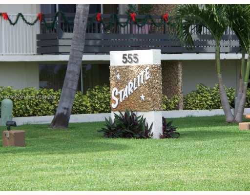 View of a building with a sign reading 'Starlite' and the number 555.