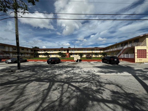 Front view of a two-story apartment building.