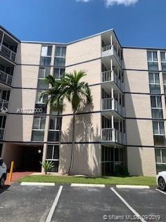 Front view of a multi-story apartment building.