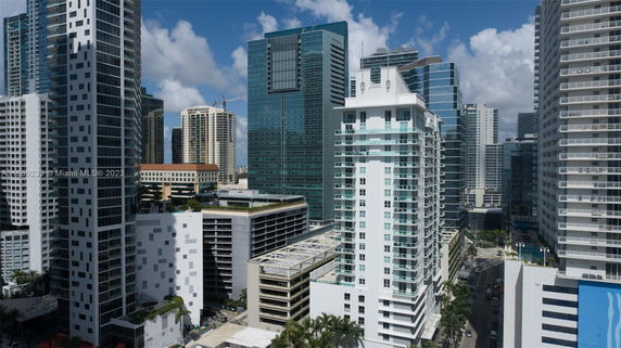 View of multiple high-rise buildings in a cityscape.