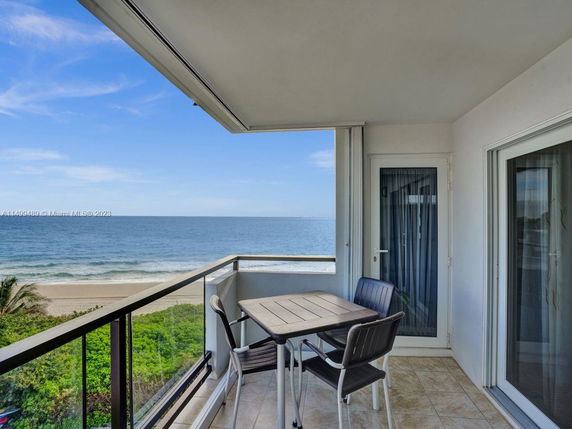 Balcony view of the ocean from a building