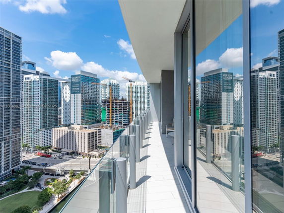 View from a building showing surrounding skyscrapers and cityscape.