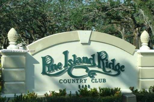 Sign for Pine Island Ridge Country Club.