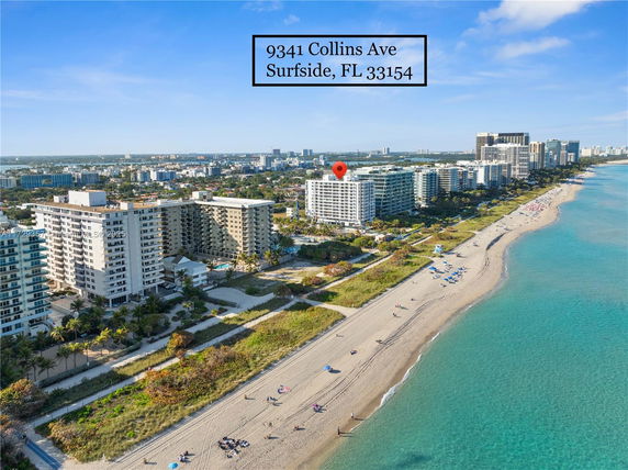 Panoramic view of beachfront buildings along Collins Ave in Surfside, FL.