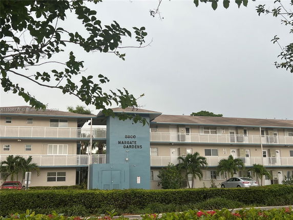 Front view of a multi-story apartment building named Margate Gardens.