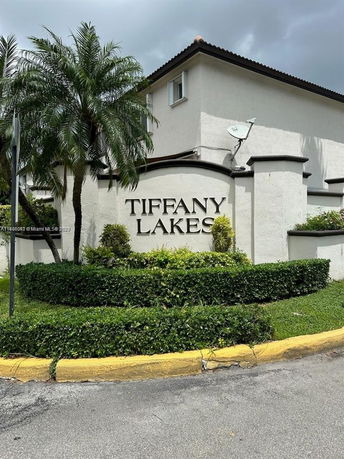 Front view of a building with a sign reading 'Tiffany Lakes'.