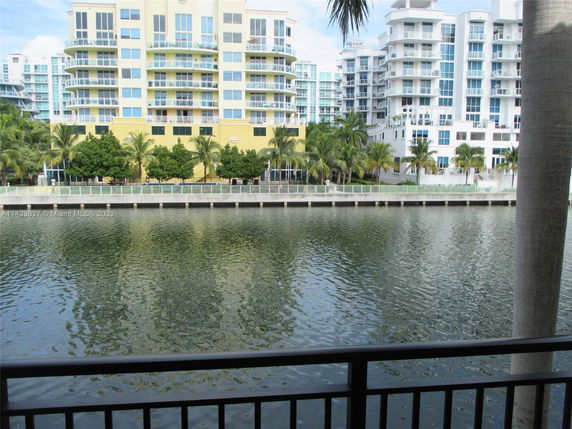 View of modern residential buildings by the water.