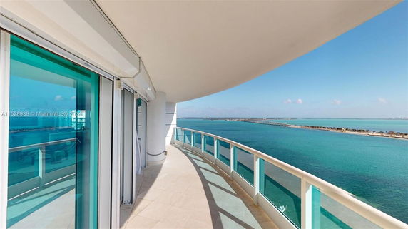 Curved balcony offering a panoramic view of the ocean.