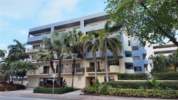 Front view of a multi-story building with a modern design.