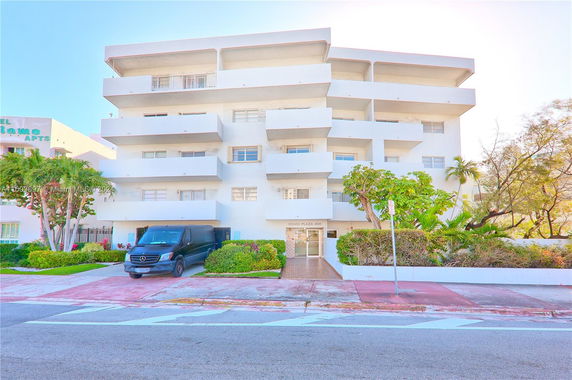 Front view of a multi-story apartment building.