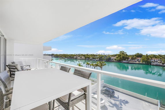 Wide angle view of a waterfront area from a balcony.