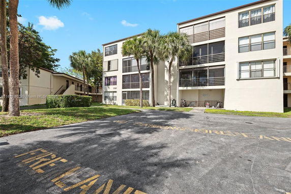 Front view of a multi-story apartment building.