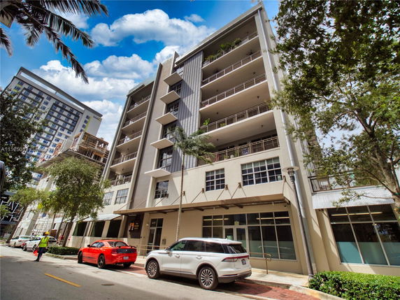 Front view of a modern multi-story building.