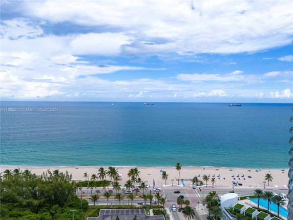 View of the ocean and beach from a higher vantage point.