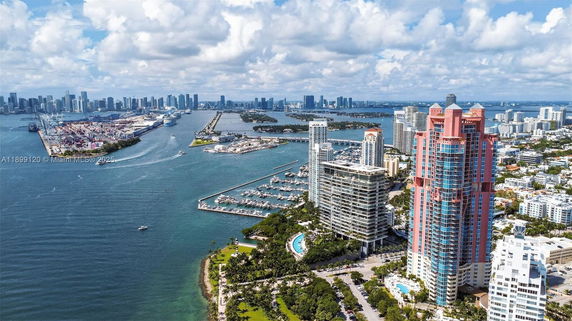 Panoramic view of high-rise buildings near a waterfront.