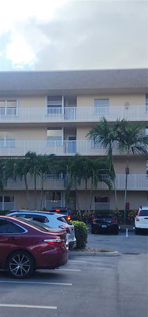 Parking area in front of a multi-story building