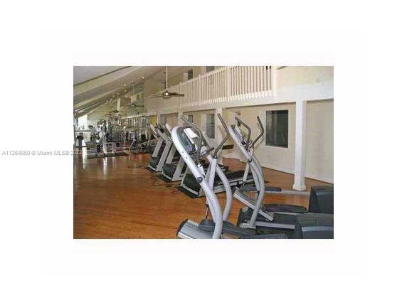 Interior view of a fitness area with exercise equipment.
