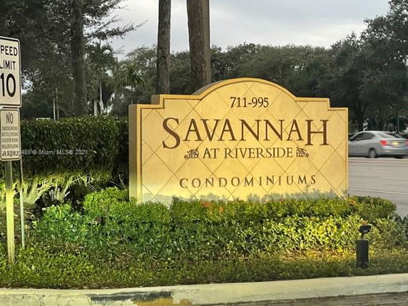 Entrance sign for Savannah at Riverside Condominiums.
