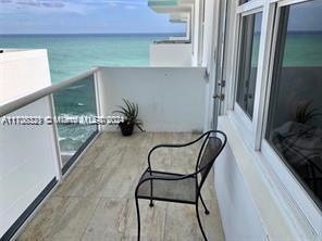 Balcony area with ocean view from the building.