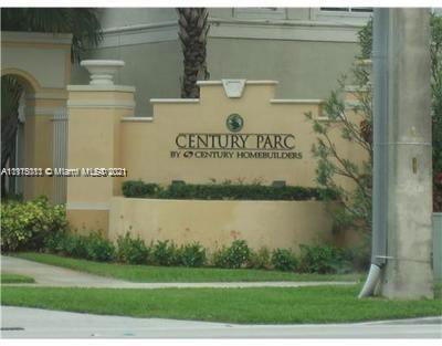 Front view of the entrance sign to Century Parc by Century Homebuilders.