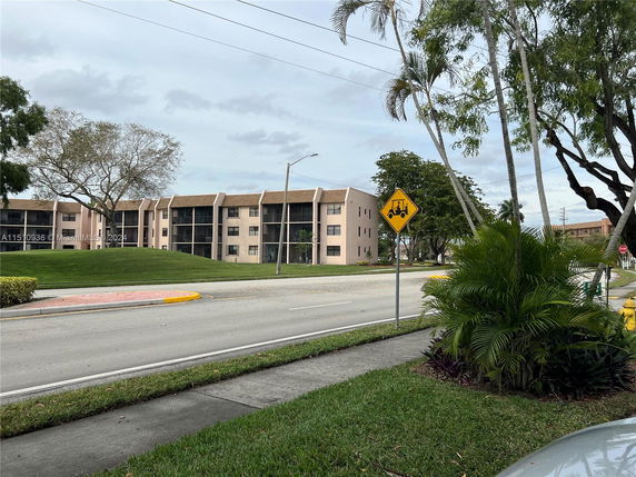 Front view of a multi-story residential building.