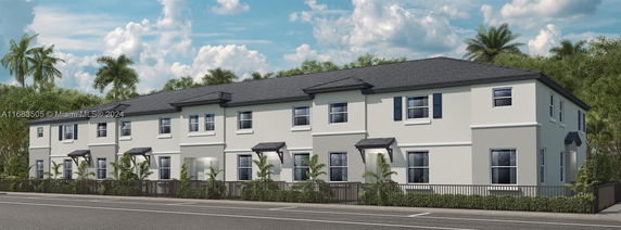 Front view of a two-story townhouse complex with multiple units and a dark roof.