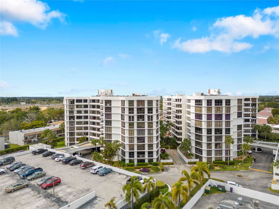 Front view of a multi-story residential building complex.
