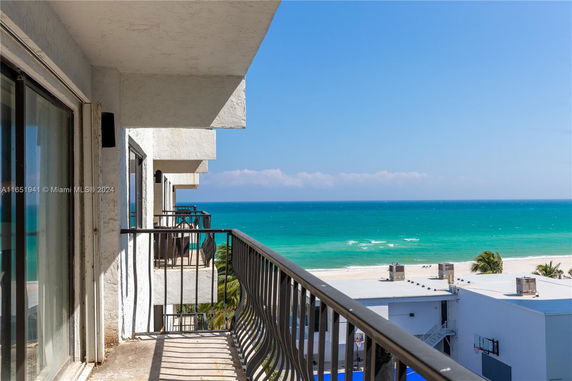 View from a balcony overlooking the ocean.