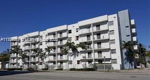 Front view of a multi-story apartment building.