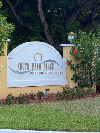 Signage of South Palm Place Condominium Homes.
