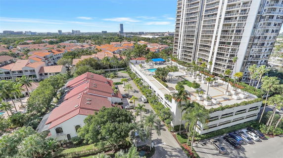 Panoramic view of a residential area with high-rise and low-rise buildings.