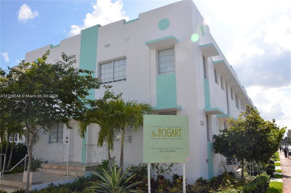 Front view of a two-story building with an art deco style facade.