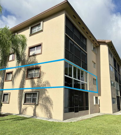 Front view of a multi-story residential building.